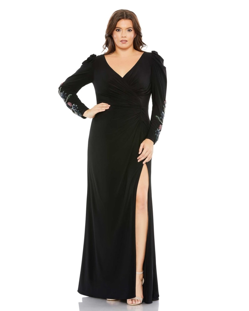 Front of a model wearing a size 14W Embellished Long Sleeve Faux Wrap Gown in Black by Mac Duggal. | dia_product_style_image_id:289943